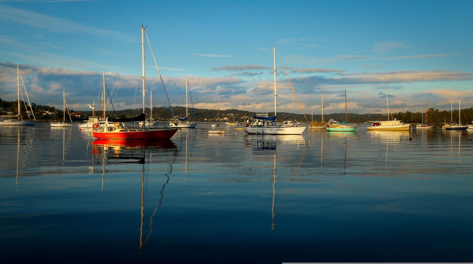 Lake Macquarie waterfront and moored boats